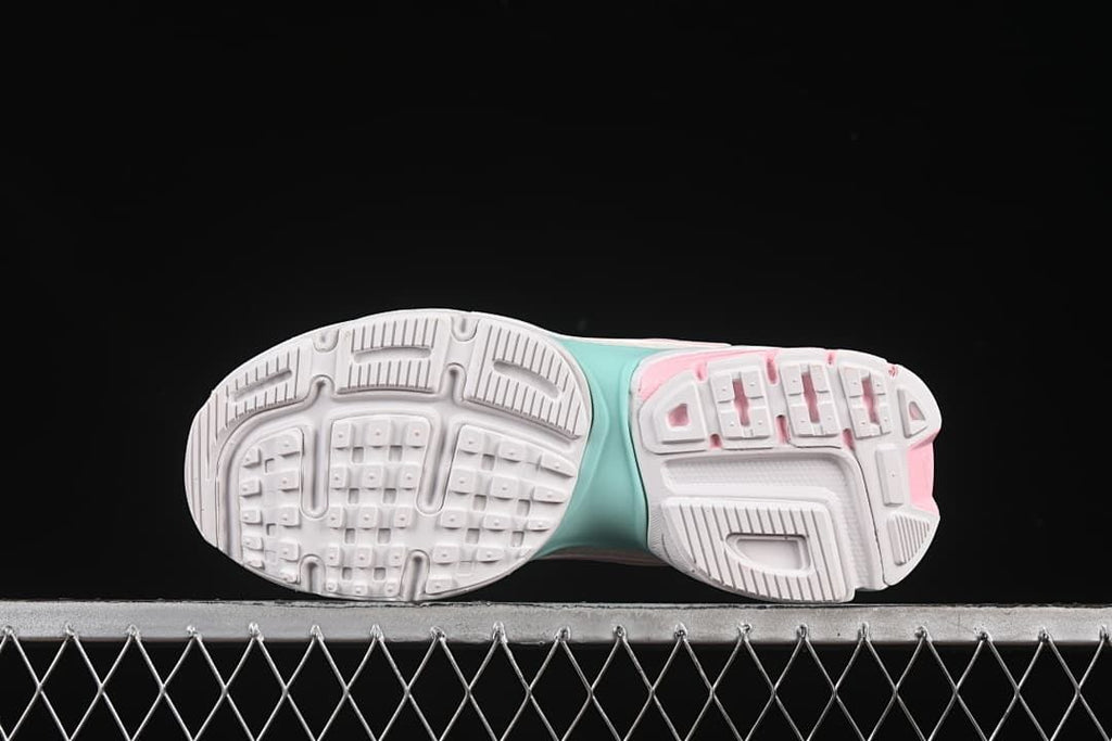 Underside view showing the patterned outsoles