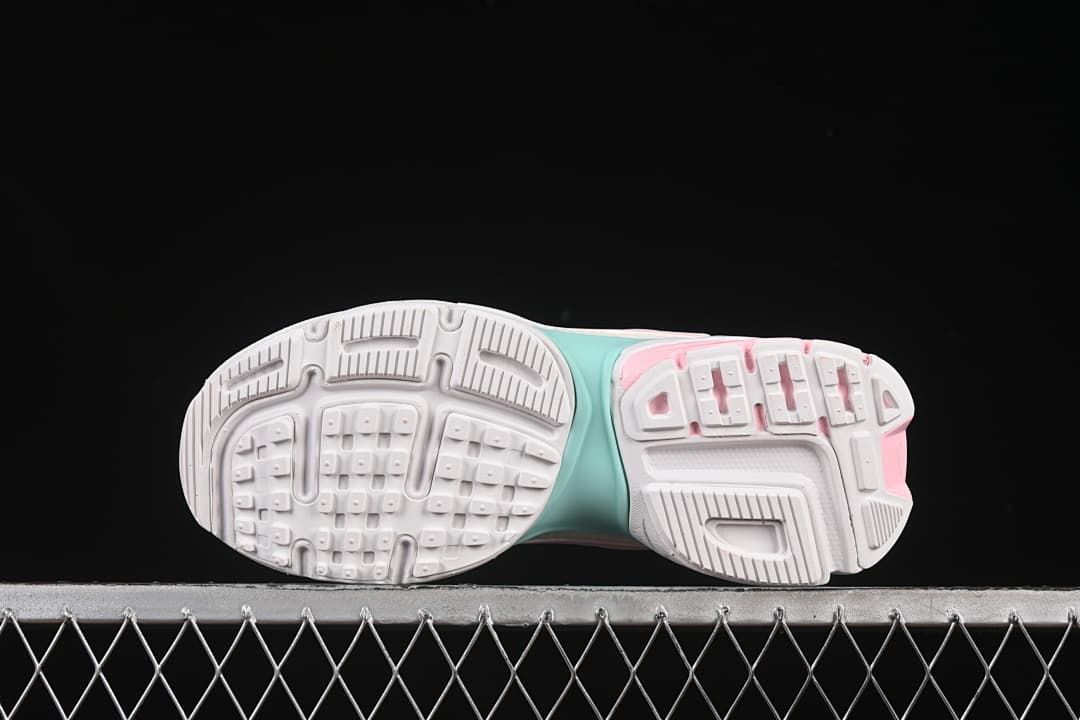 Underside view showing the patterned outsoles