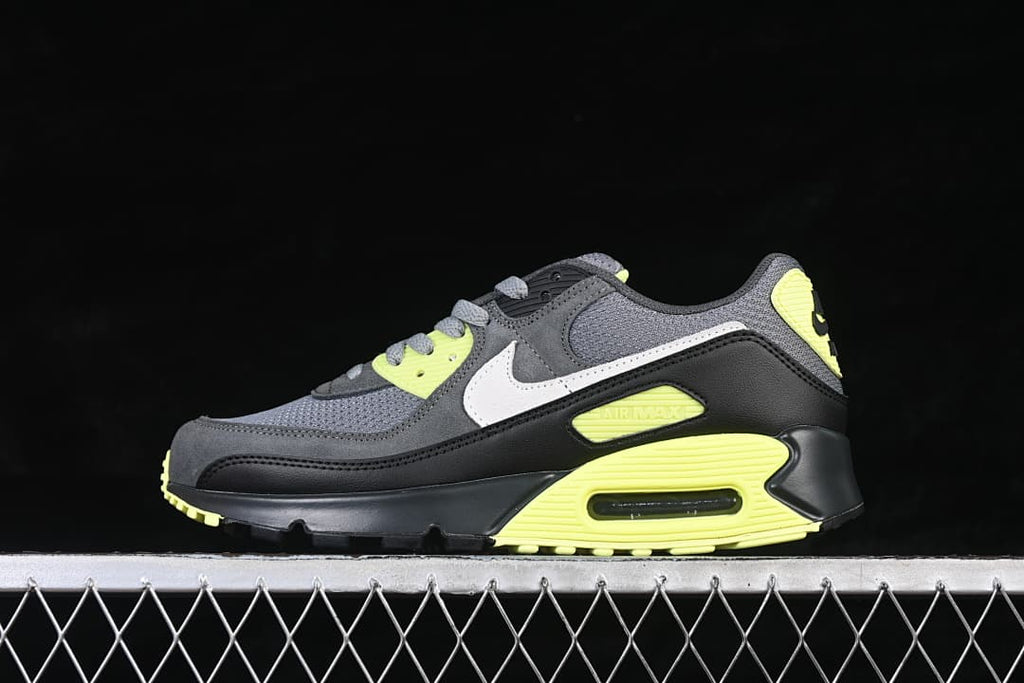 Opposite side view of the Nike Air Max 90 in grey, black, white and volt.
