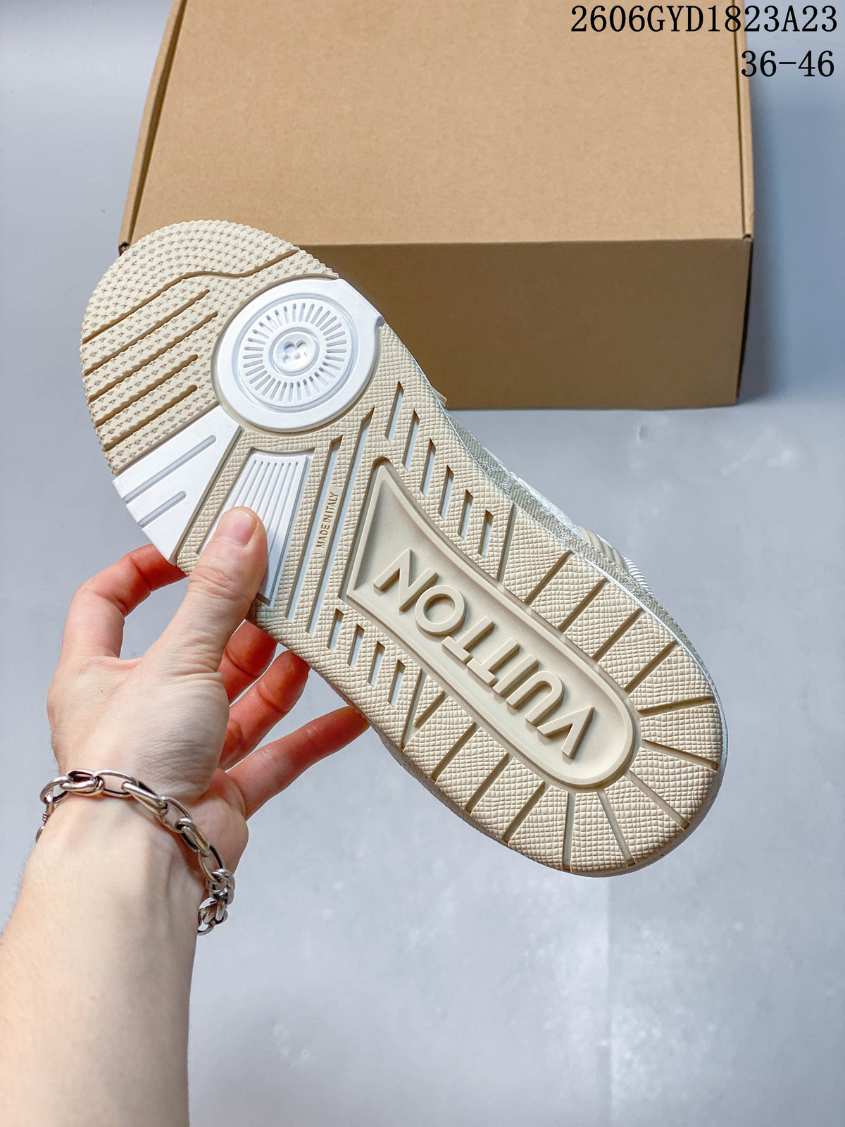 Textured outsole of a white and beige Trainer Low sneaker
