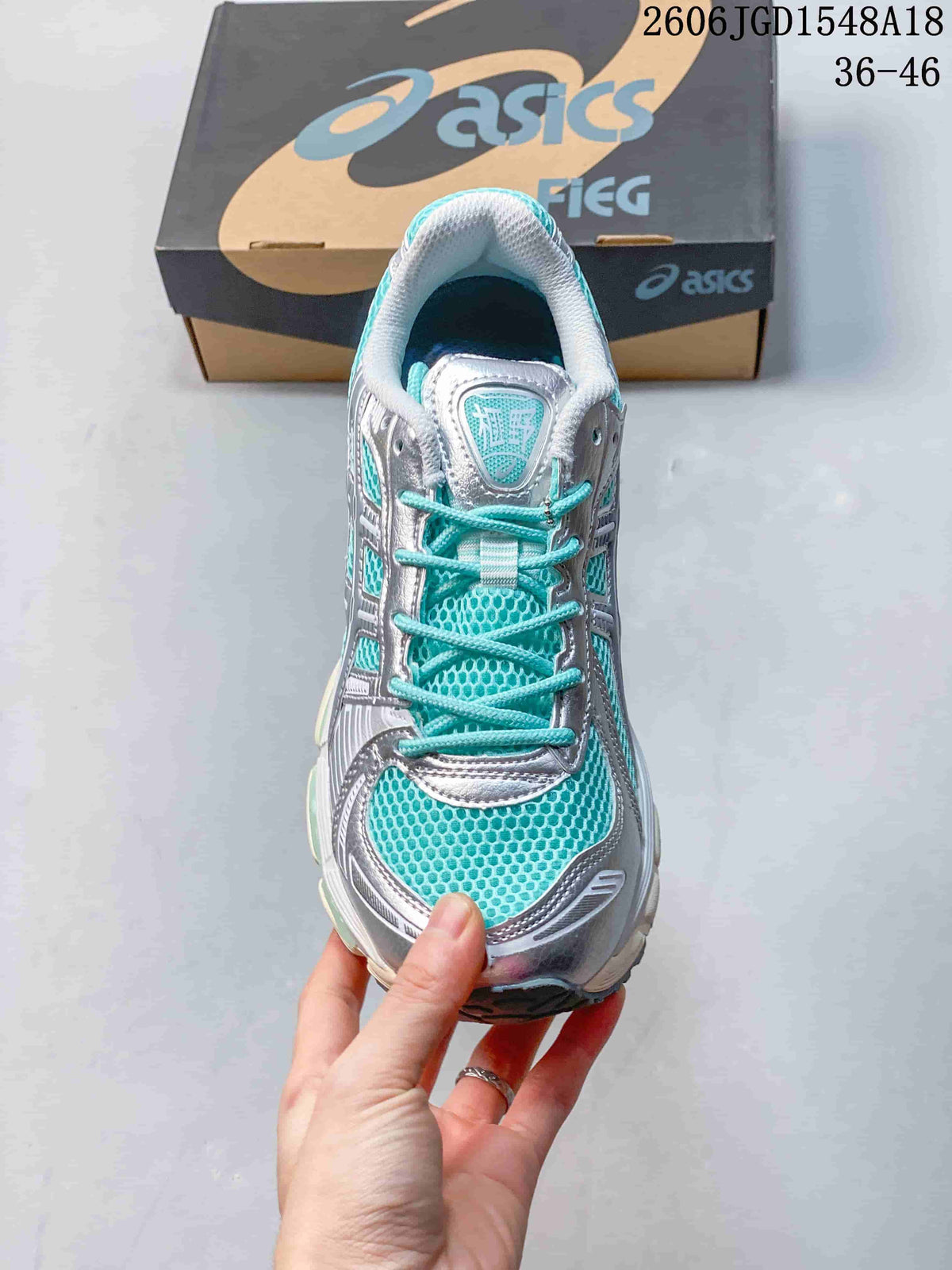 Top view showing the turquoise mesh, laces, and silver-look overlays.