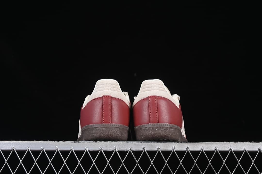Rear view showing burgundy heel panels and cream heel overlays