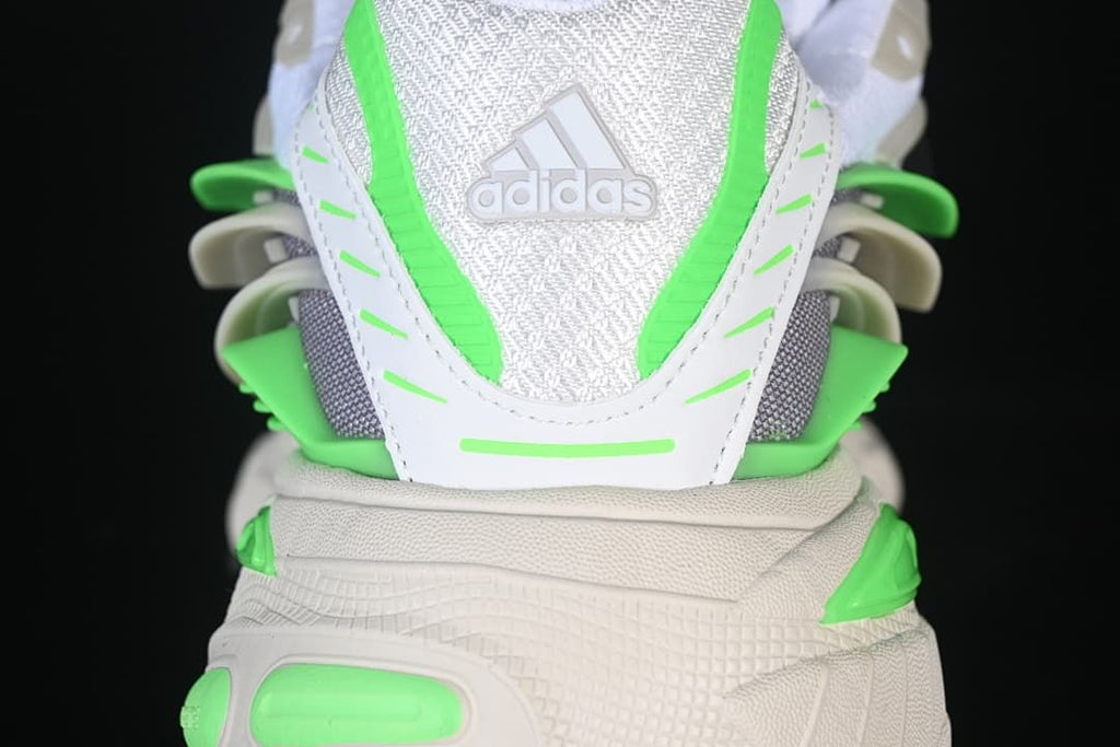 Rear view of the sneaker showing its heel details and bright green accents.