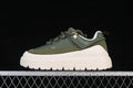 Side view of a green UGG Heritage Utility Sneaker with an off-white chunky sole