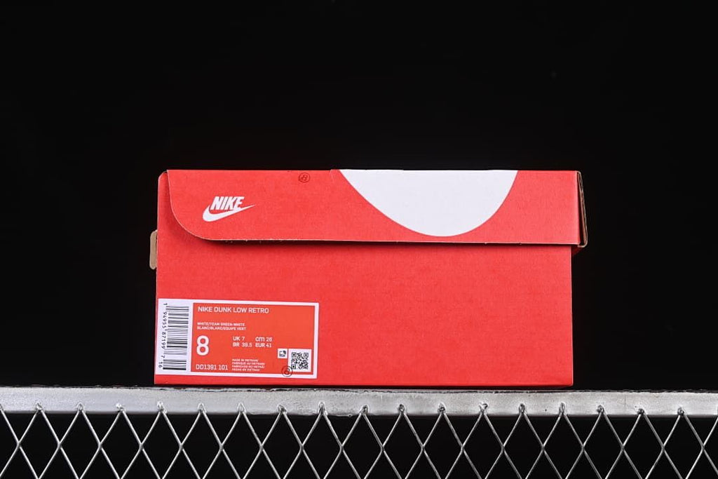 Red Nike shoe box labeled Nike Dunk Low Retro and DD1391 101