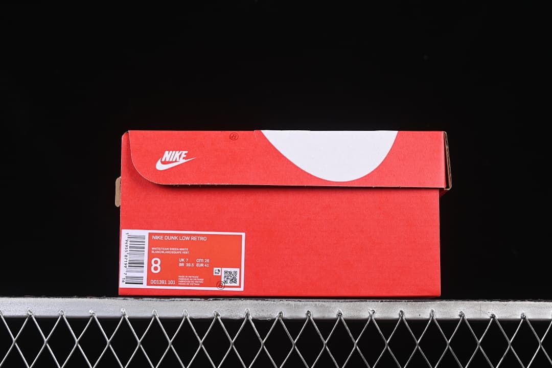 Red Nike shoe box labeled Nike Dunk Low Retro and DD1391 101