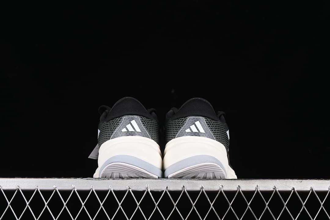 Rear view of both shoes showing heel panels and outsoles.