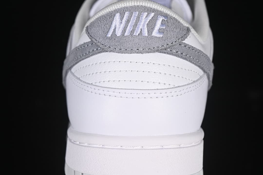 Rear view showing grey heel panel and white stitching