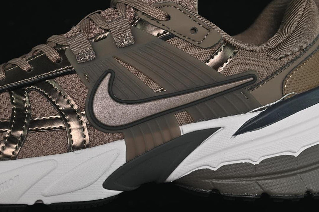 Close-up of the side Swoosh, overlays, and sculpted midsole