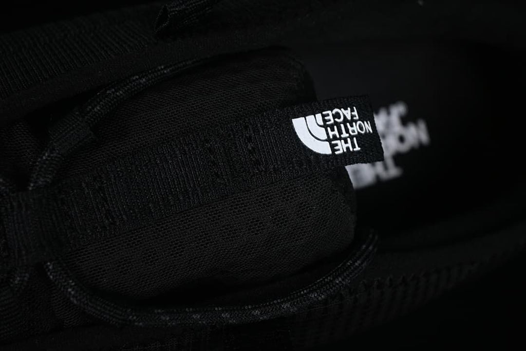 Close-up of tongue branding and laces