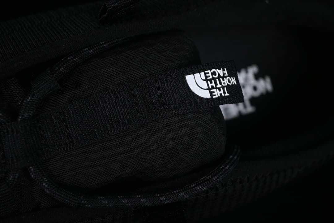 Close-up of tongue branding and laces