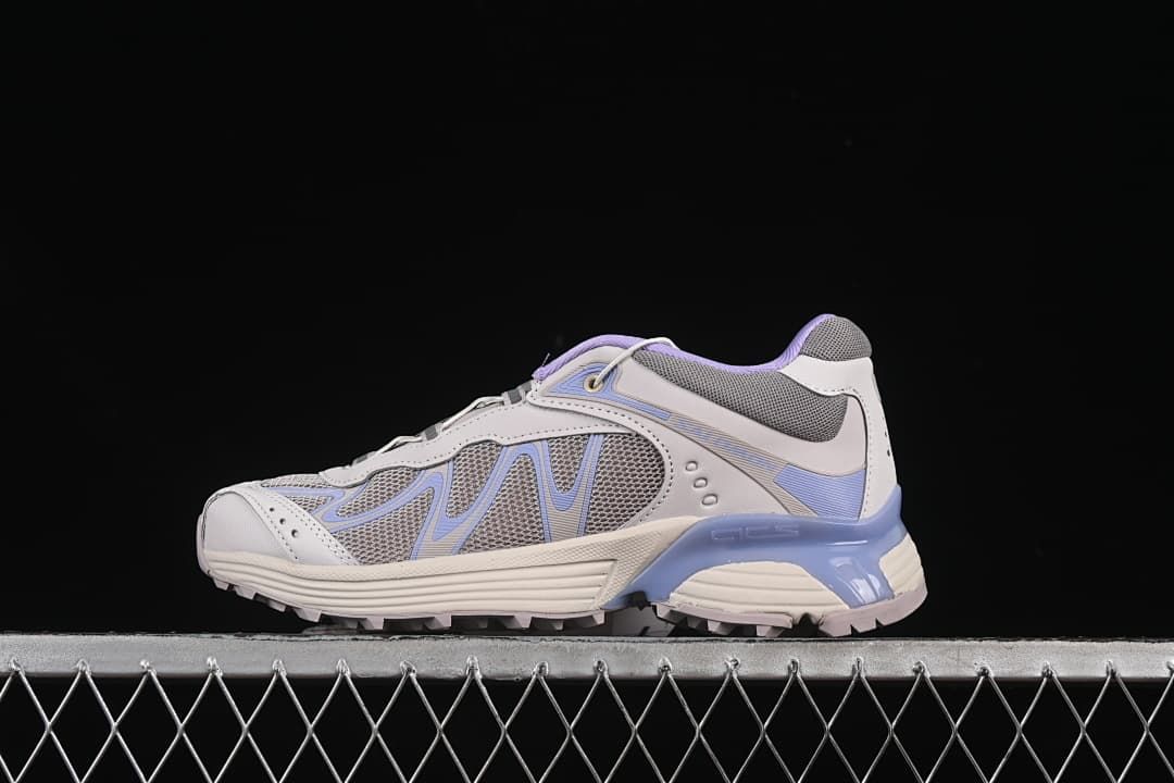 Side view of the Salomon XT-Whisper in gray, off-white, and lavender-blue.