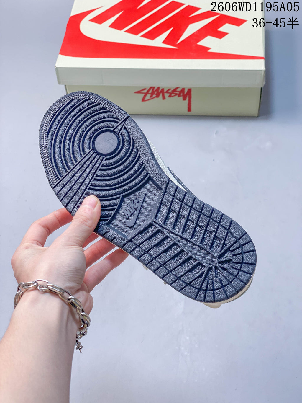 Close-up of the dark navy patterned outsole