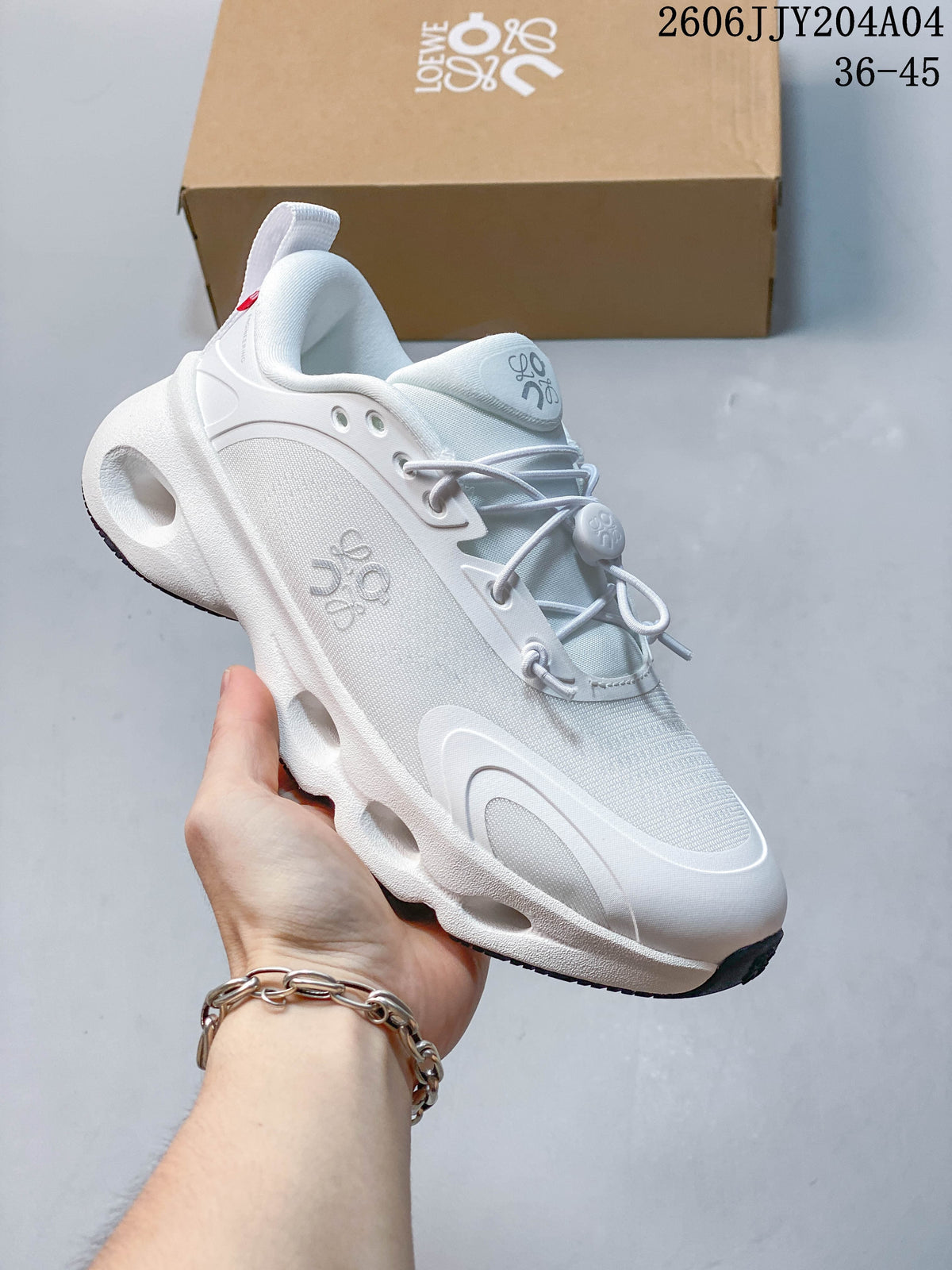White and pale gray On Cloudtilt sneaker with a sculpted sole and cord-style laces.