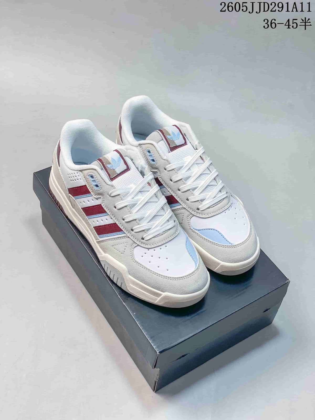 Pair of white and light gray Tekkira Cup sneakers with burgundy and pale blue accents