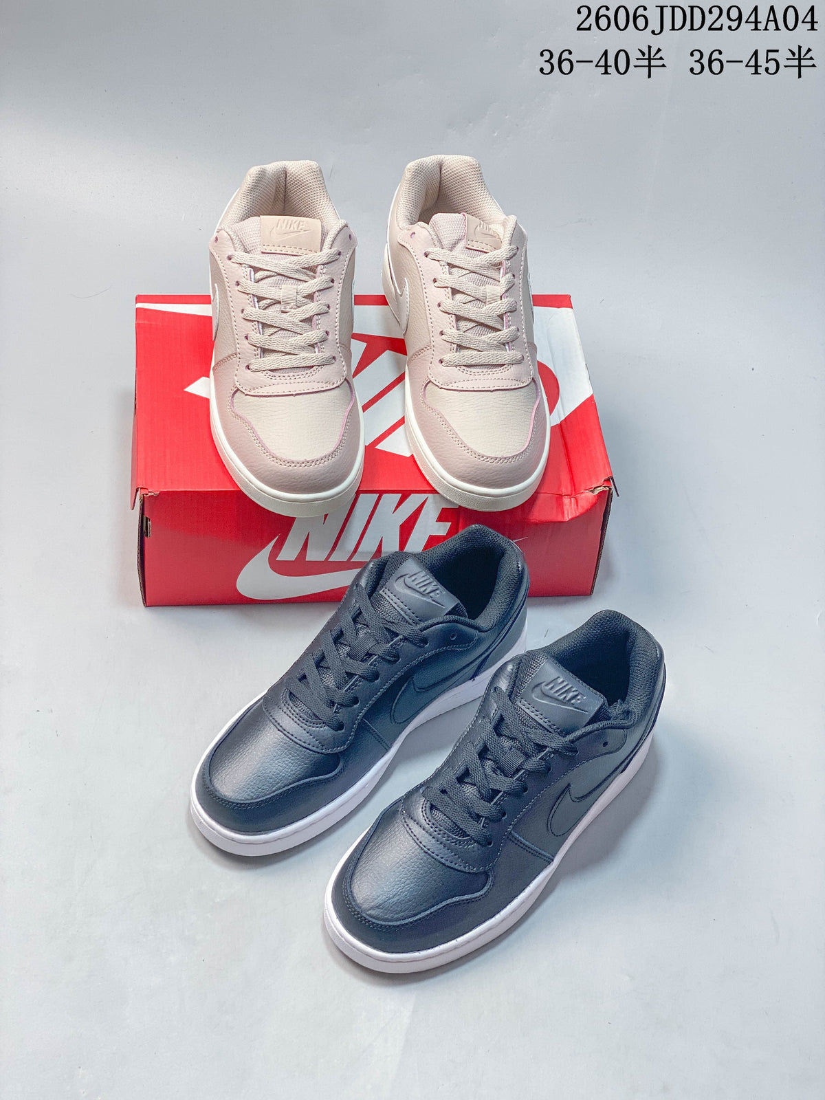 Pale pink and dark navy Nike Ebernon Low sneakers; image text shows size ranges 36–40.5 and 36–45.5.
