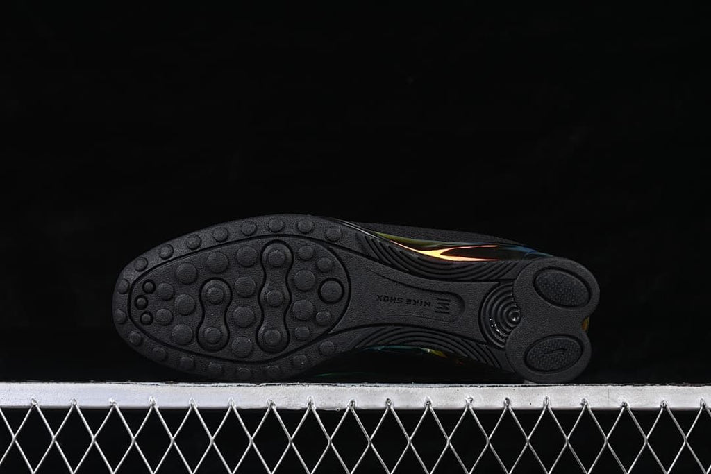 Outsole view showing the circular tread pattern.
