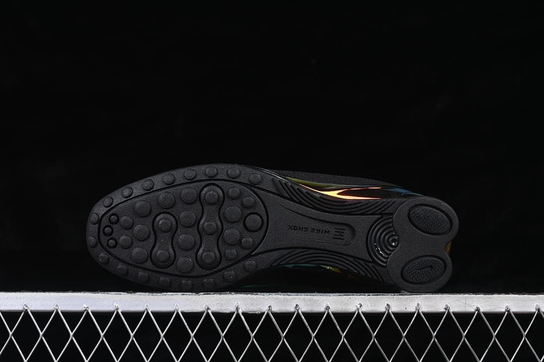 Outsole view showing the circular tread pattern.