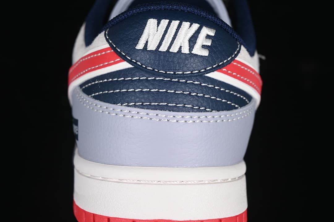 Rear view showing Nike heel branding and red accents