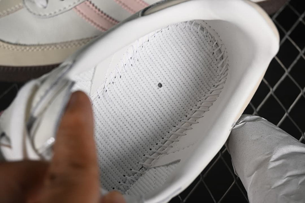 View inside the sneaker showing the footbed and lining