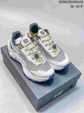 White and gray KAILAS FUGA EX330 trail shoes with yellow laces and purple outsole lugs