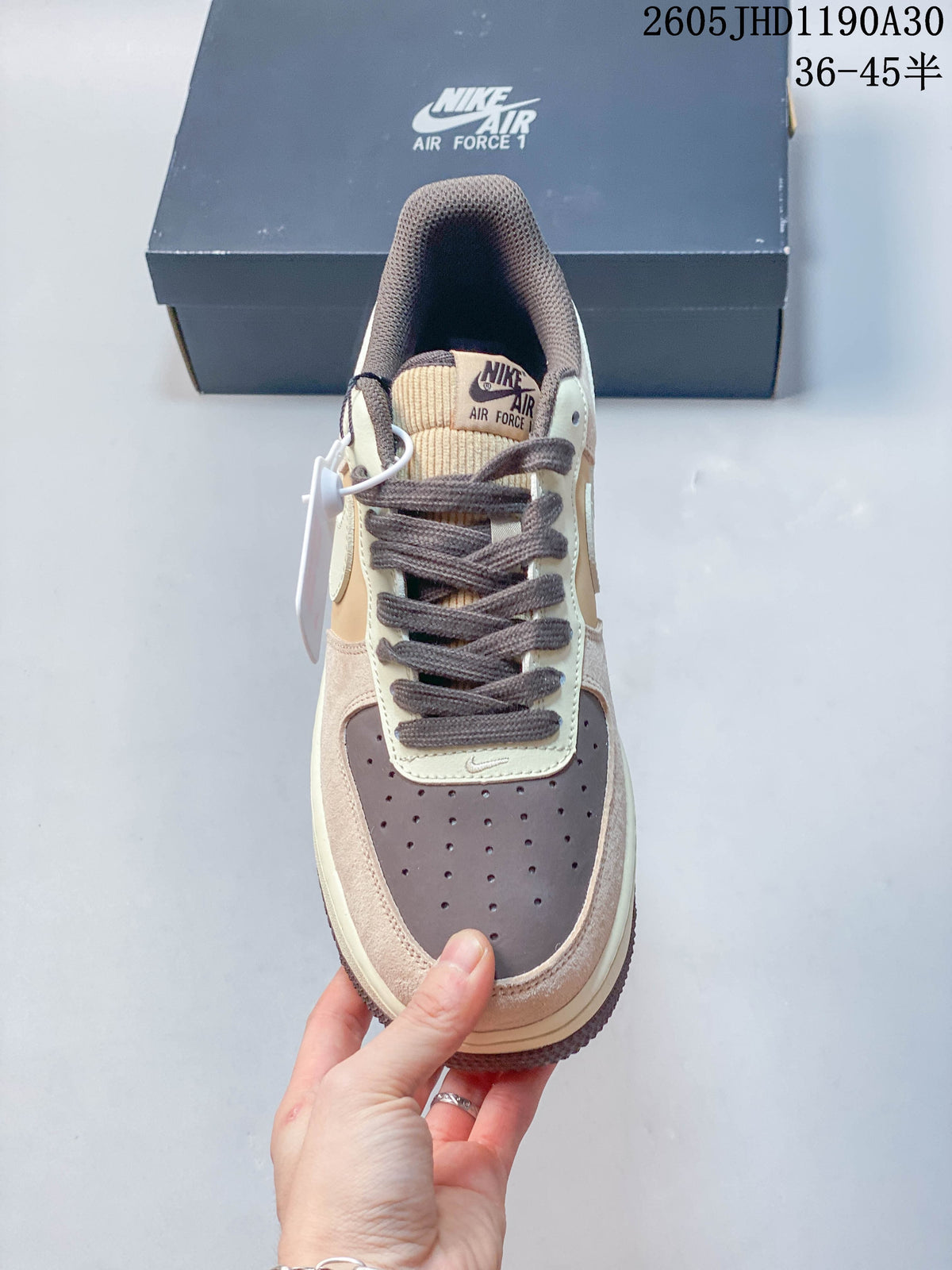 Front view of the Nike Air Force 1 sneaker showing its perforated toe and laces
