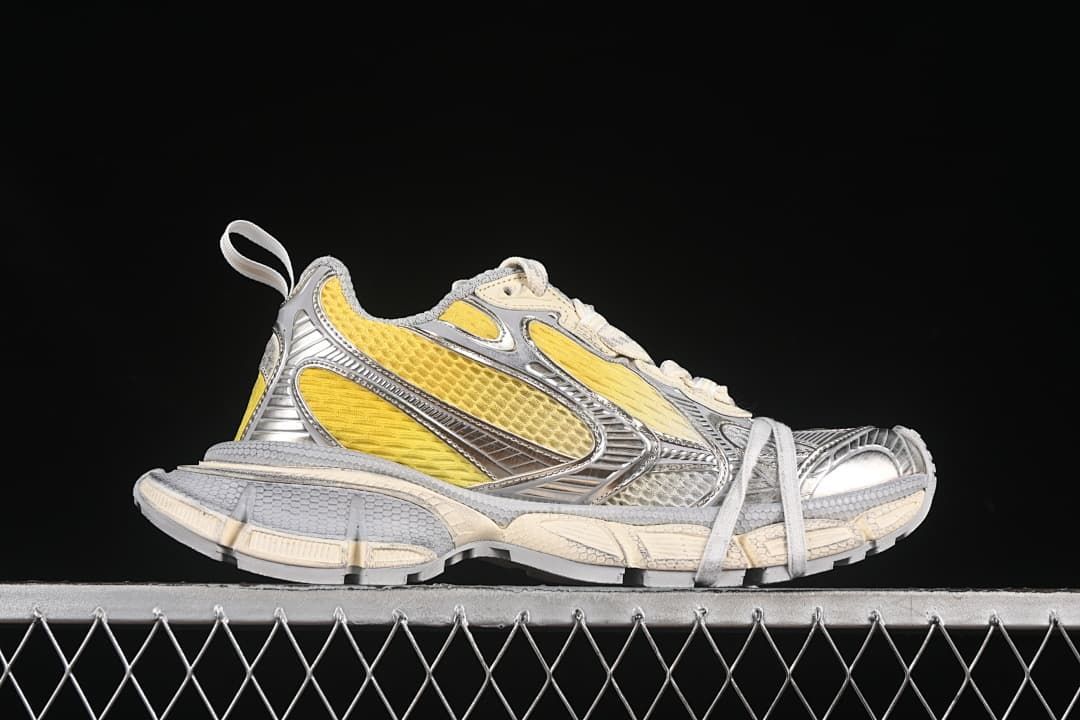 Side profile of the sneaker showing its layered design and pull tab