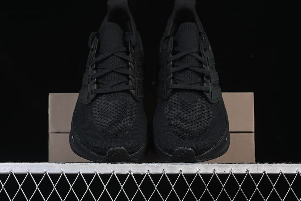 Front view of the pair of black lace-up shoes.