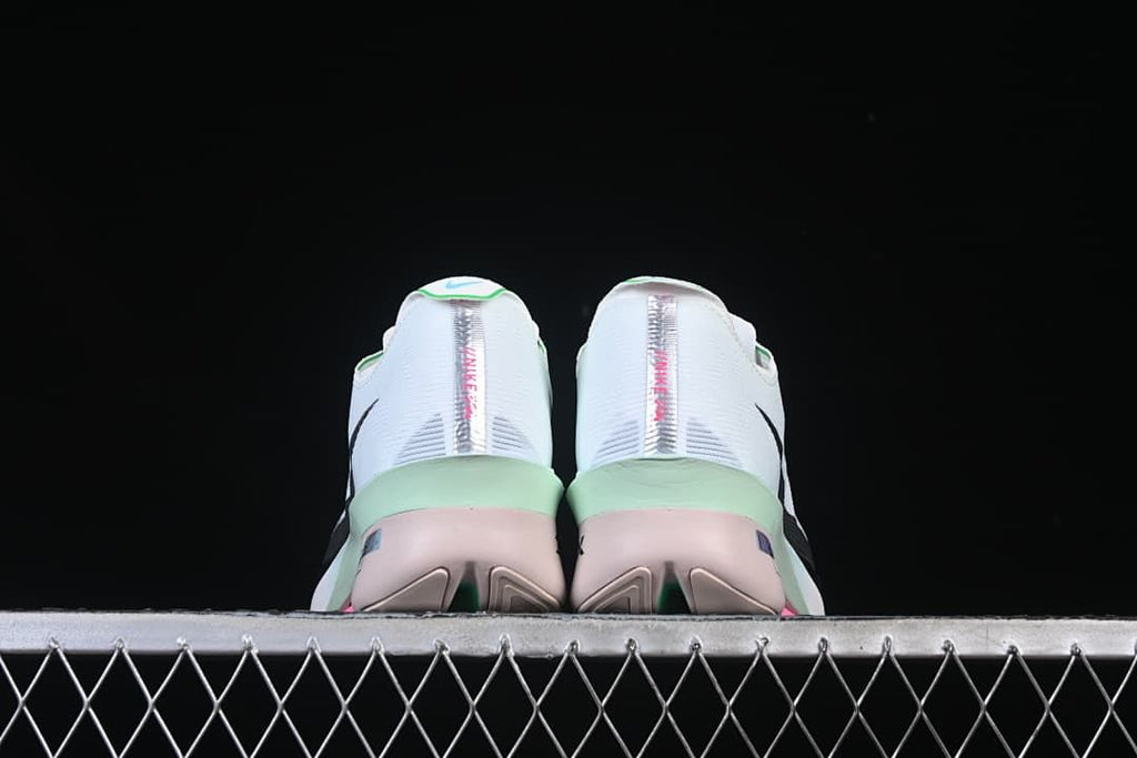 Rear view of both shoes showing heel details and outsole
