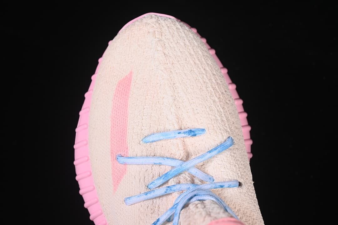 Top-down view of the toe and blue laces.
