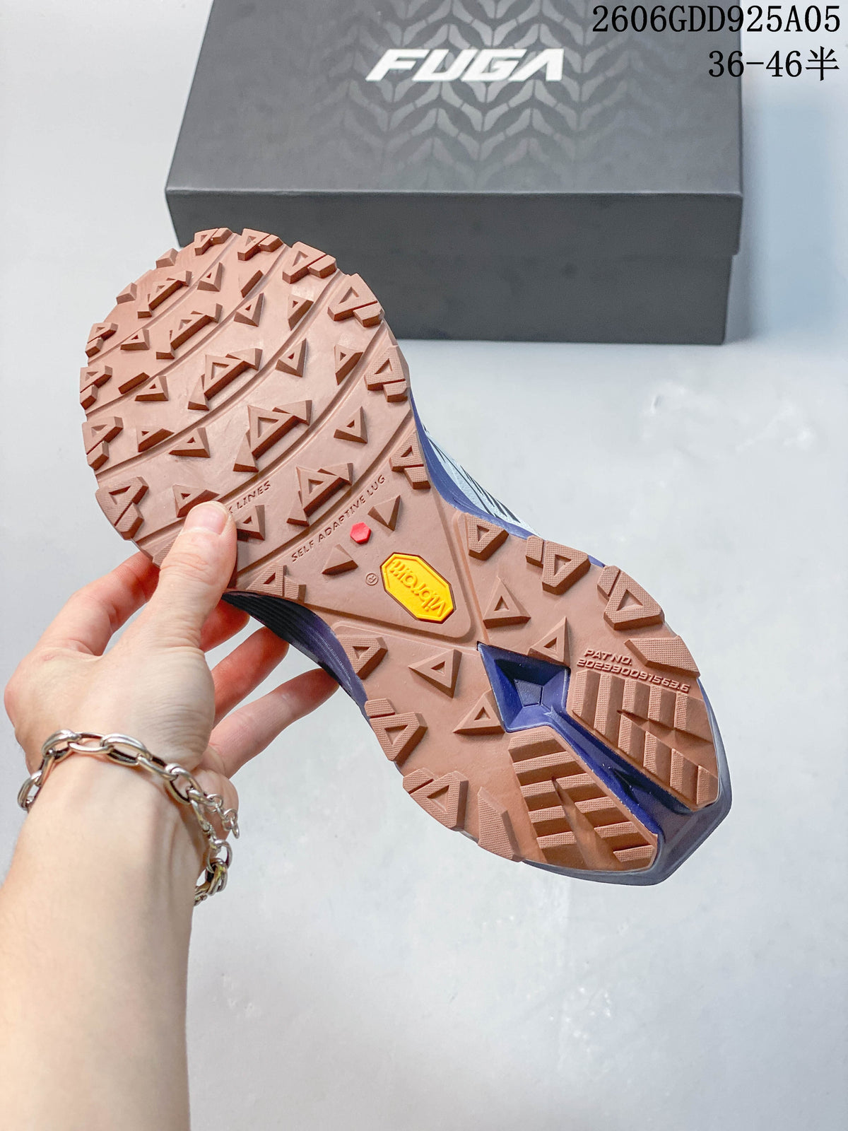 Close-up of the lugged outsole with VIBRAM branding on a KAILAS FUGA EX3 shoe