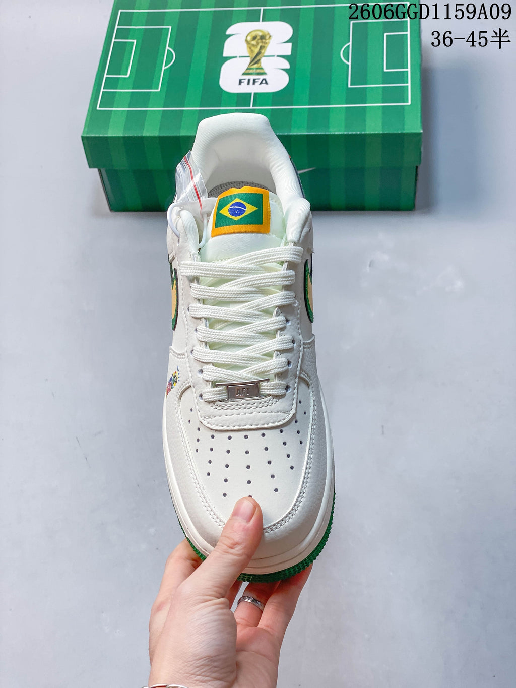 Front view showing perforated toe, white laces, and Brazil flag tongue detail; image overlay reads 36–45.5.