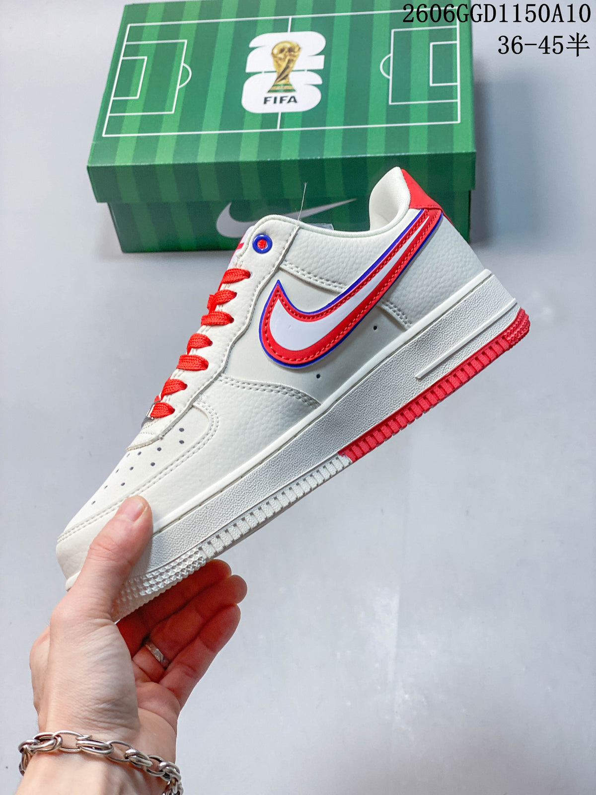 Side profile of the off-white low-top sneaker with blue-and-red Swoosh detailing