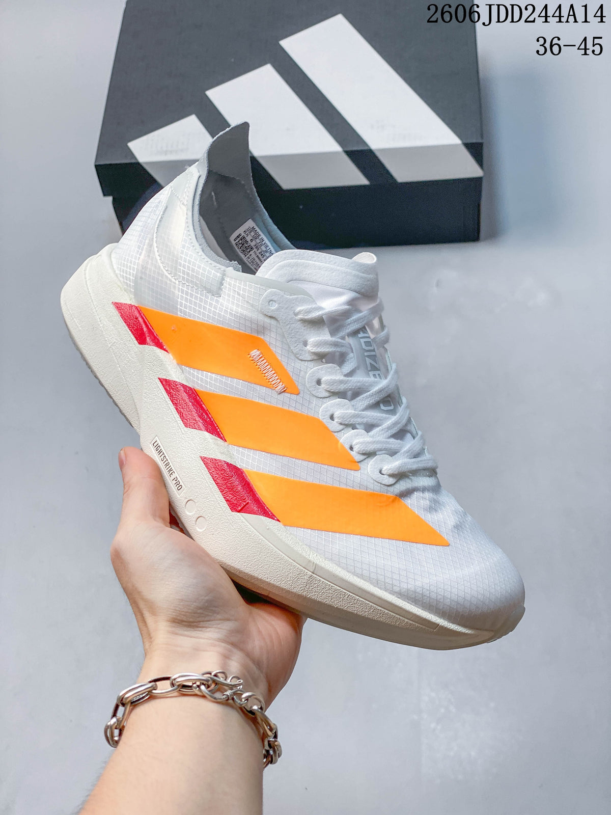 Side profile of the white running shoe with orange stripes and red accents; image overlay states EU sizes 36–45.
