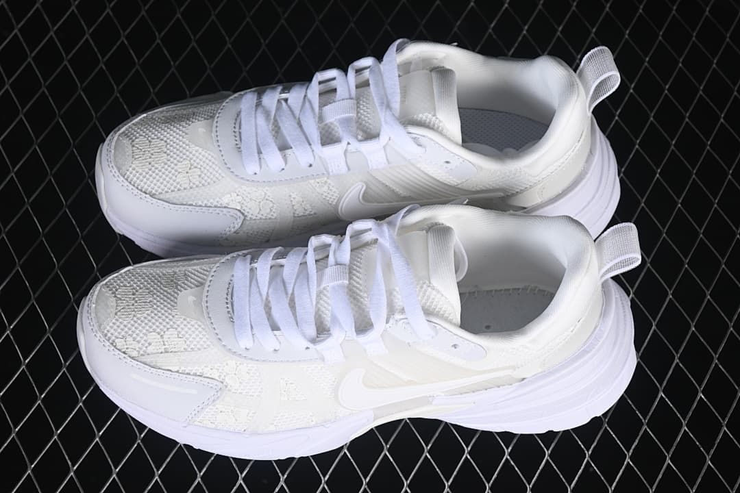 Pair of white Nike V2K Run sneakers viewed from above