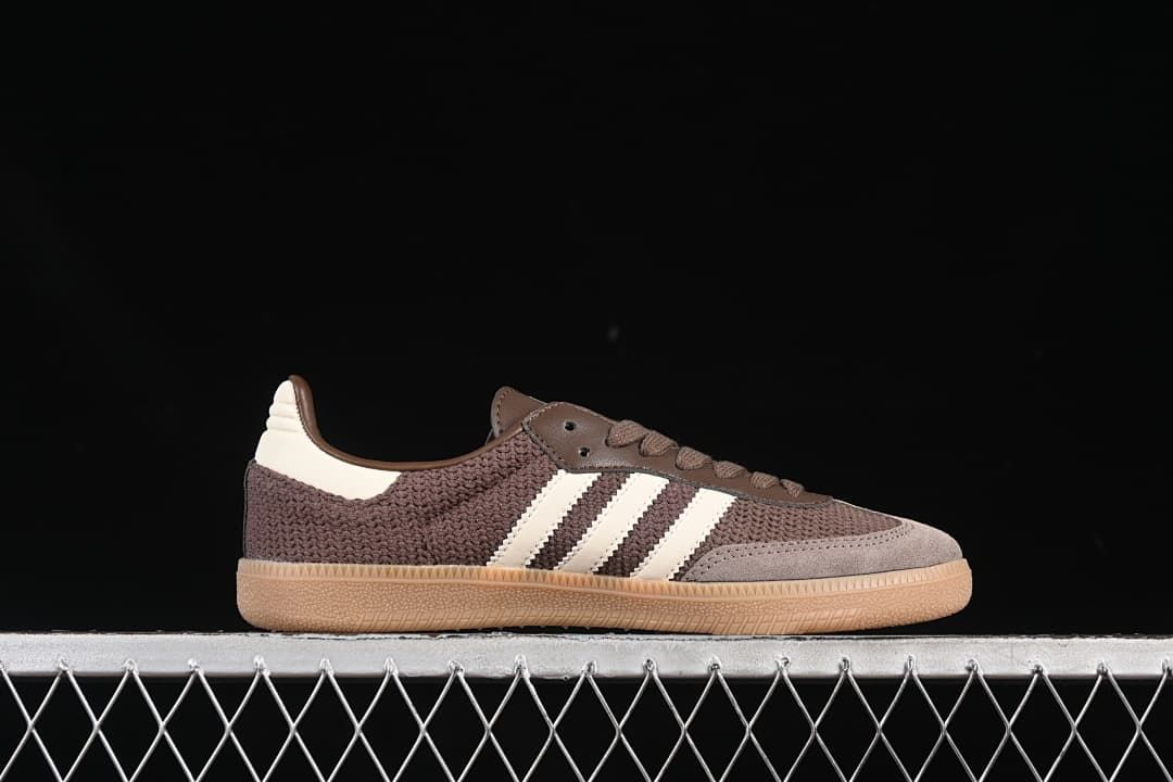 Side profile highlighting the brown upper, off-white stripes and gum outsole