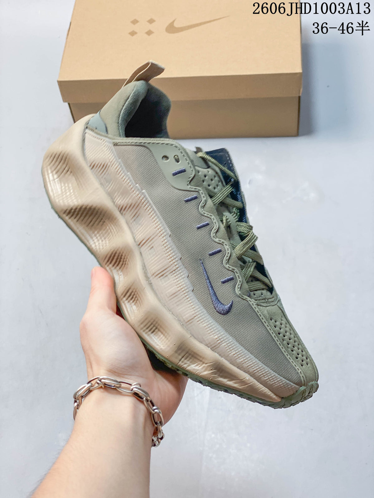 Side view of a sage-green Nike Ava Rover sneaker with contrasting Swoosh accents