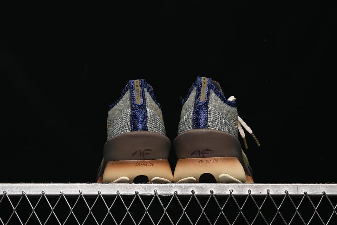 Rear view of the pair showing heel details and soles