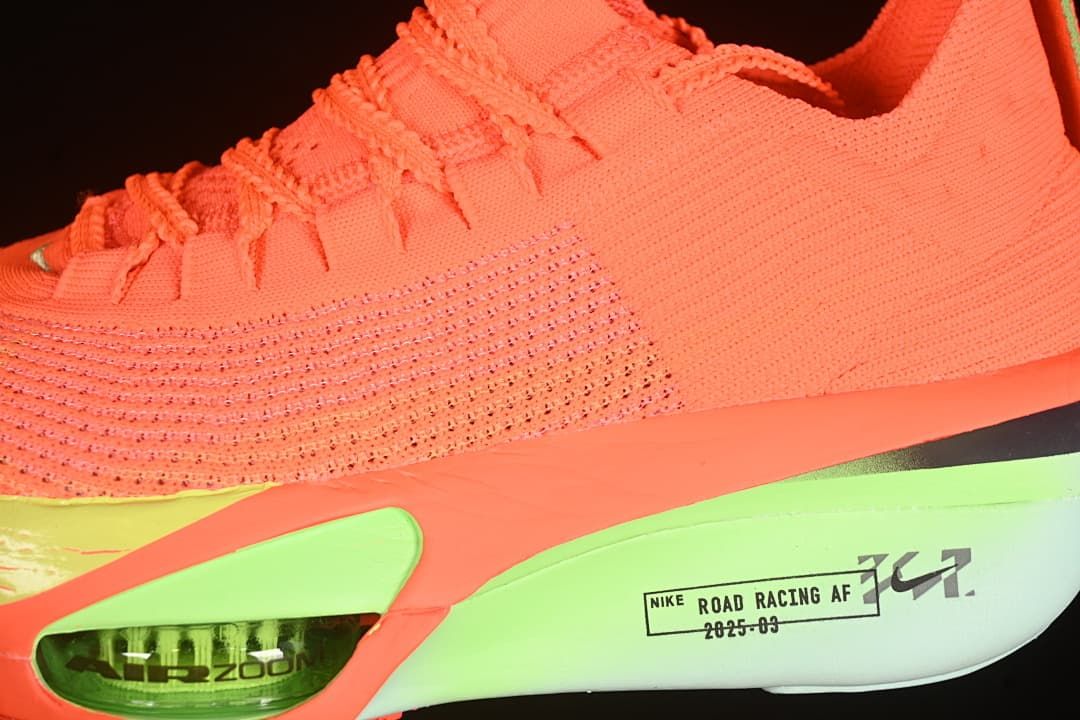 Close-up of the knit-style upper, side details, and midsole