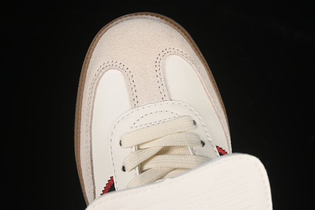 Top view of the suede-look toe overlay, laces, and fold-over tongue.