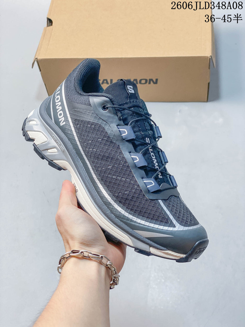 Side view of the Salomon XT-6 FT sneaker and its textured outsole