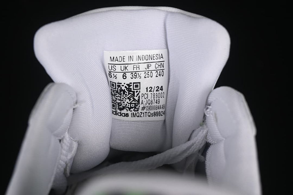 Sneaker tongue size label showing US 6.5, UK 6, FR 39 1/3, JP 250, and CHN 240