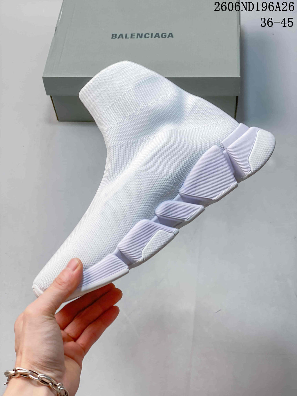 Side view highlighting the textured upper and sculpted segmented sole.