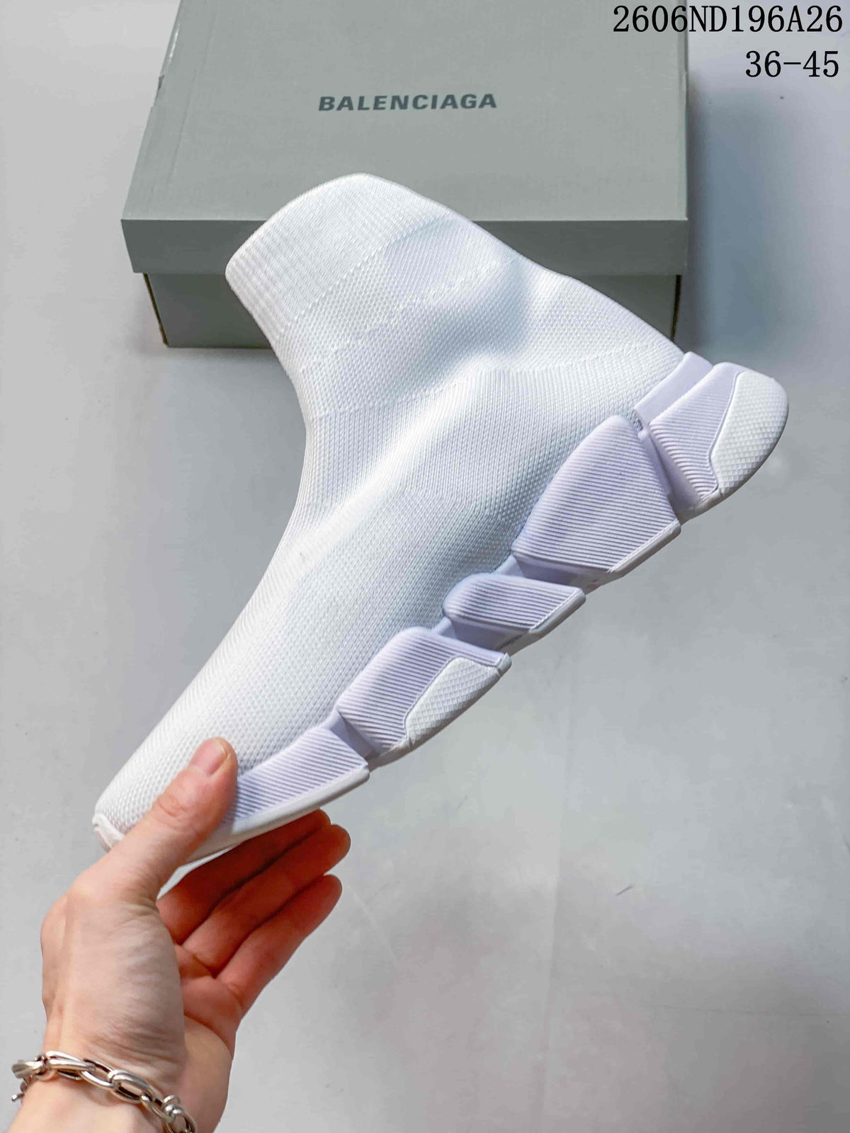 Side view highlighting the textured upper and sculpted segmented sole.