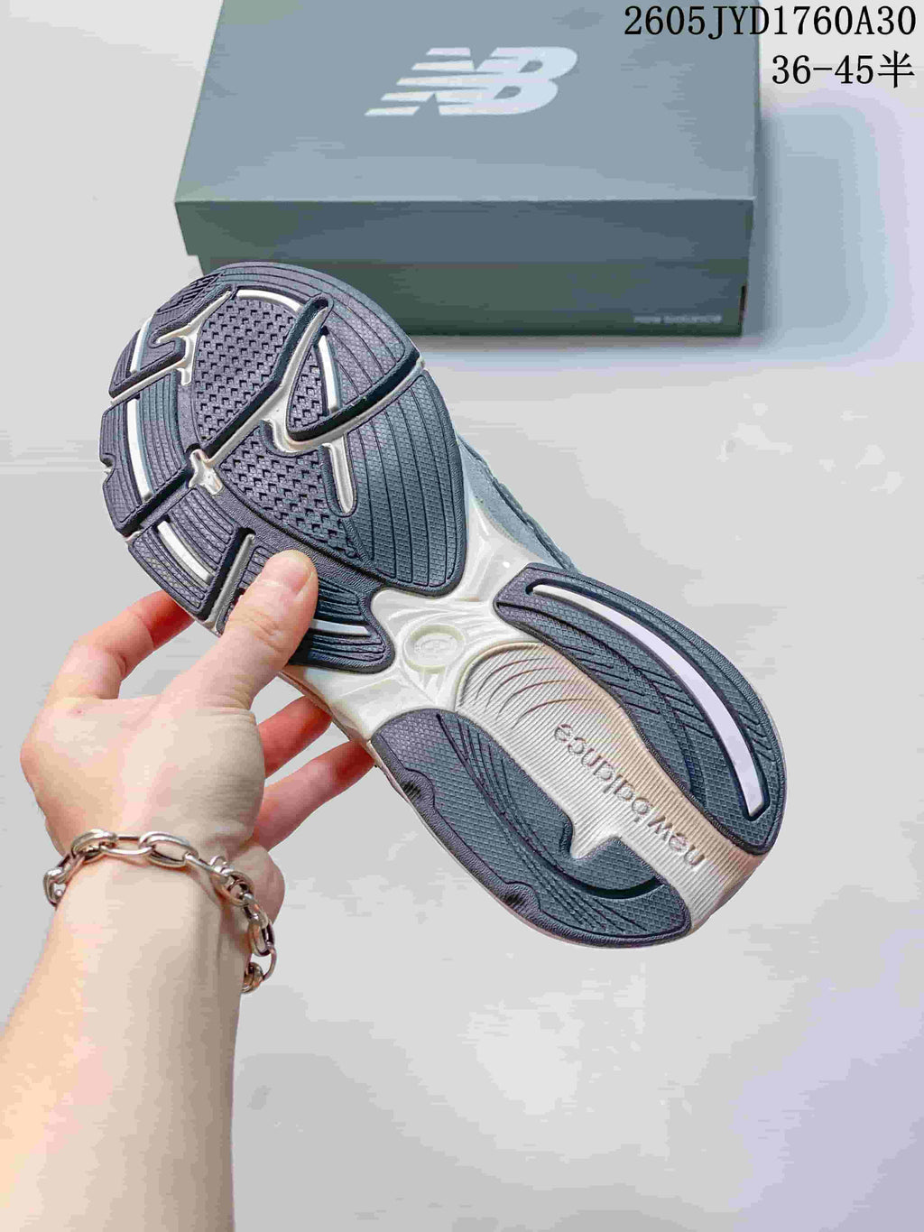 Outsole view of a grey New Balance 2010 sneaker