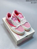 Pair of pink and white low-top sneakers shown from above on a shoebox