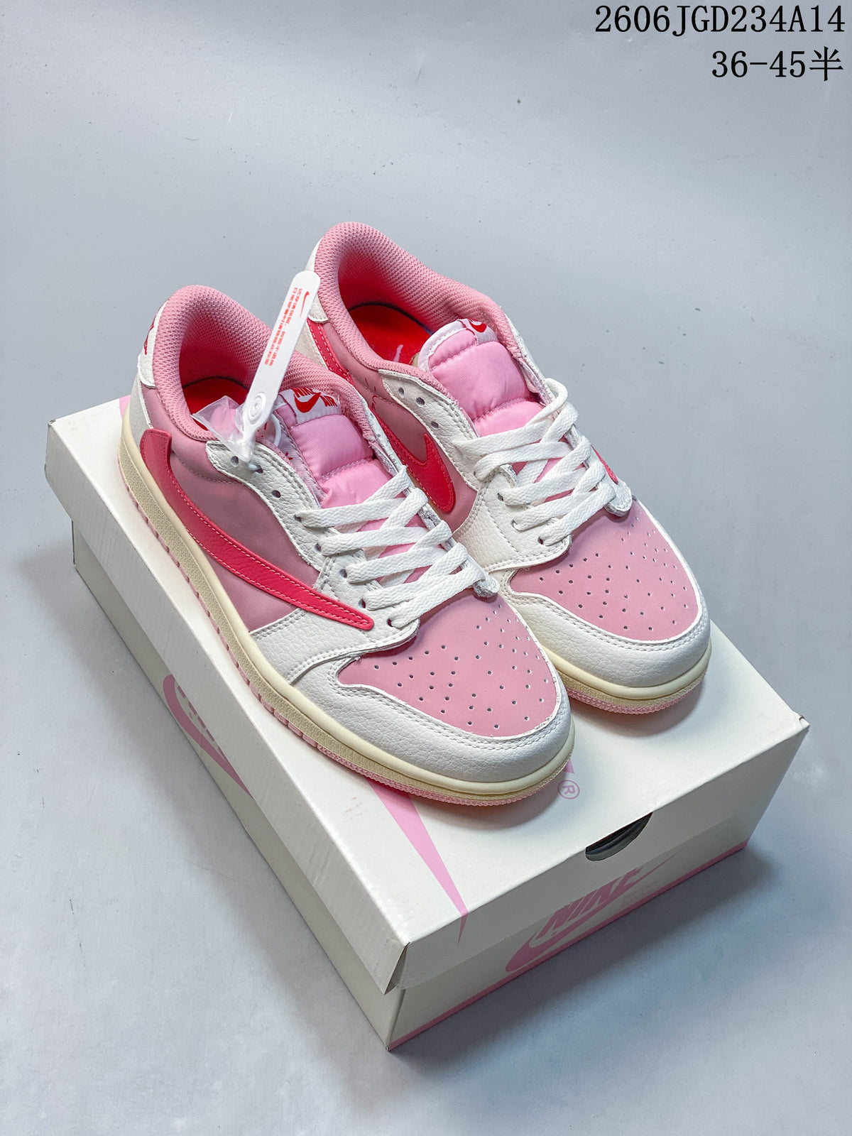 Pair of pink and white low-top sneakers shown from above on a shoebox