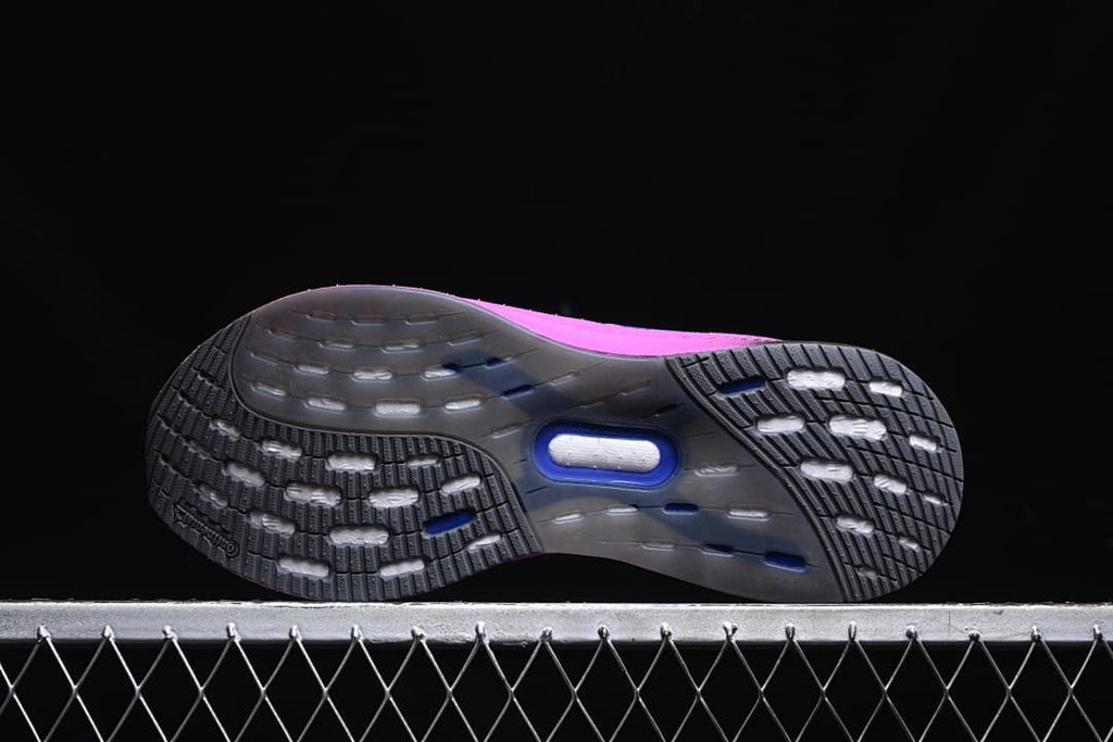 Outsole view showing the tread pattern and colored midsole edge