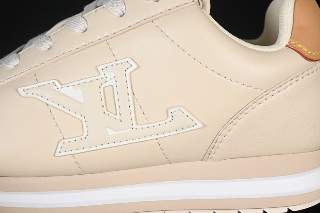 Close-up of oversized side emblem and beige panels