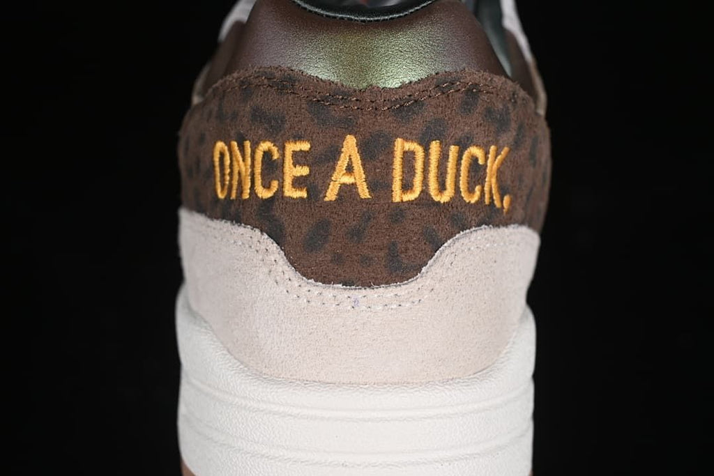 Heel embroidery reading “ONCE A DUCK”